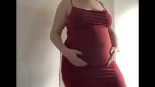 Round Chubby Stomach In A Red Dress