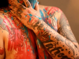 Beautiful Tattooed Girl with Paint Strokes