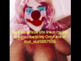Sexy clown shows off huge tits on slide show 