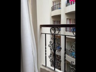 College girl naked on balcony