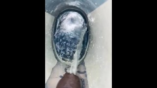 Peeing into a bucket