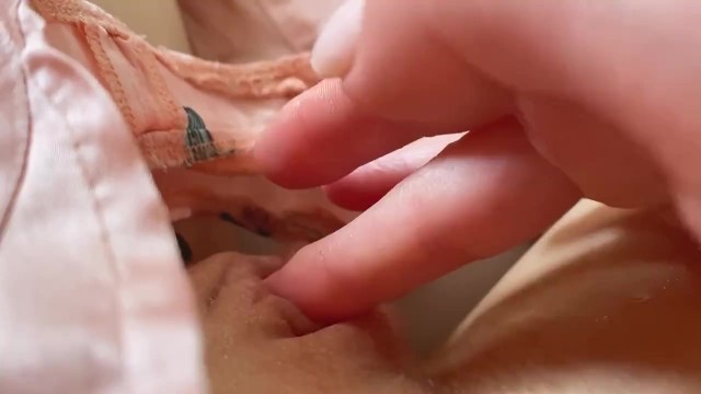 Cutie is teasing her pretty little pussy full of grool. Girl cums in panties
