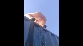 Blonde PISSING Off The Top Of SHIPPING CONTAINER