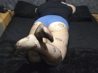 Wolf playing with her feet while laying down and relaxing do you want to play too?