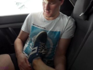 Colleague from highschool gave me footjob in a car