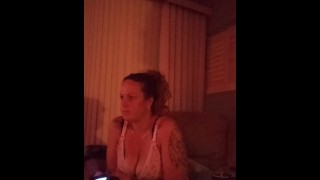 Milf with cleavage showing playing video games 