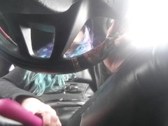 Woman mastrubates driving in traffic  and cums twice
