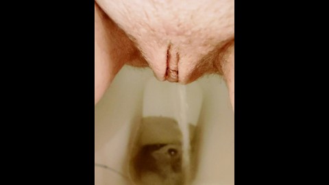 Short powerful piss closeup