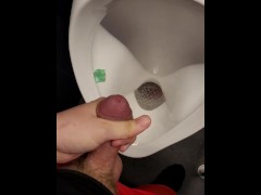 Risky wank in public toilet 