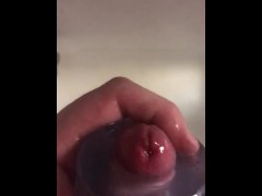 Edging hard cock in shower with sleeve