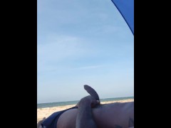 Masturbating on beach