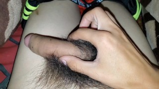 Rubbing pubic hair and cock