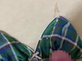 Masturbated in a green checkered non-wired bra and splashed a lot of semen on it.