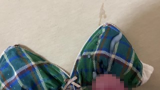 Masturbated in a green checkered non-wired bra and splashed a lot of semen on it.