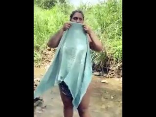 Changing dress in river