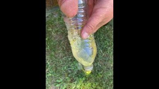 Filling what i could of a bottle with piss GOLDEN SHOWER PEE FETISH