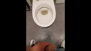 Horny Guy Pissing and Jerking Off at Public Toilet