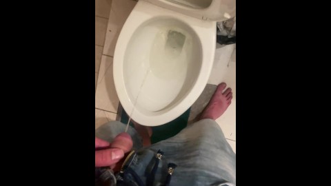 Piss into shared hostel toilet