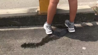 The Bitch Urinates On Public Roads Which Are Filthy