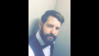 Guy wearing uniform touches his cock because he is excited