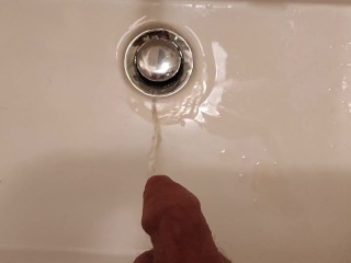Taking a Leak in the Sink at Work