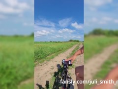 A girl rides a bike completely naked!