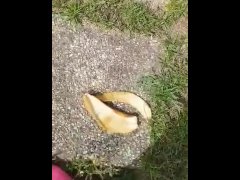 Girl crushing banana
