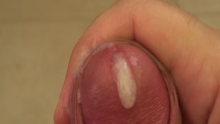 Close up cumshot using vibrating cock ring outdoors