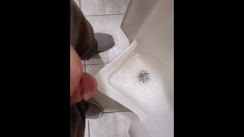 Pissing at a grocery store mens room