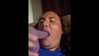 Sean teasing with a purple dildo