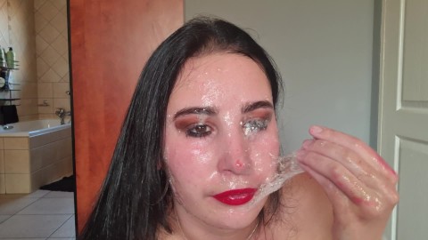 Red lips slut playing with her own spit as she gags on her own hand and a dildo | blowing bubbles