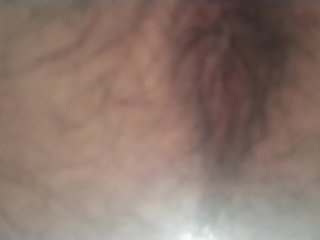 A hairy Japanese man squats and masturbates. The contraction of his anus at moment of ejaculation