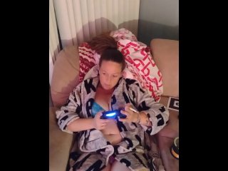 Caught gamer girl in panties and bra playing video games with legs wide open
