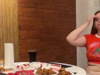 Cute girl overeating KFC. Big Belly Bloat. Painful Stomach