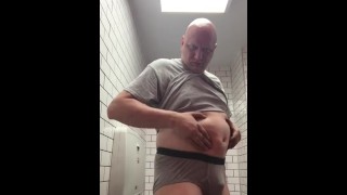 Piggy fingers ass in restroom