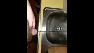 Sean takes a piss in the sink