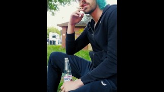 Using a public restroom to piss in a bottle and drink iut outside while having a smoke