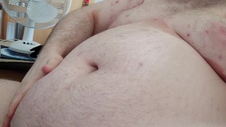 Chubby rubs his fat belly