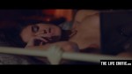Beautiful girl fucks herself with a dildo while watching porn