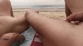 SEX AT THE PUBLIC BEACH naked I jerk him off people see us he cums anyway