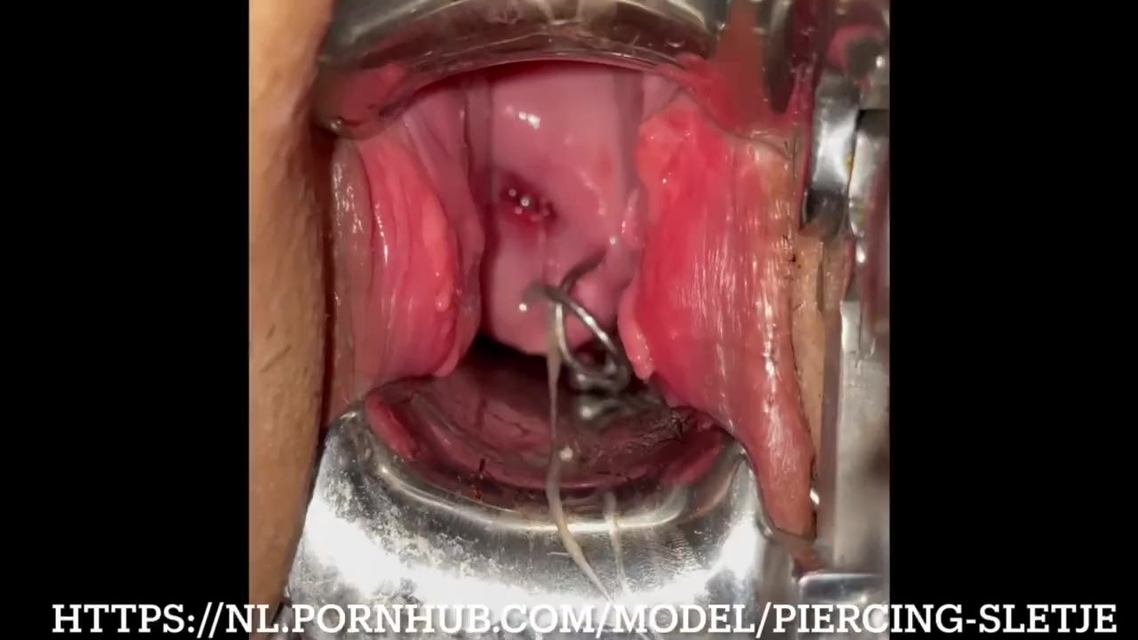 Sounding her uterus with nice view on her second uterus piercing!