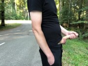 Preview 2 of Guy jerks off his big curved cock by the roadside and cums
