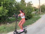 Preview 1 of A naked girl rides a scooter through the streets and shocks passers-by
