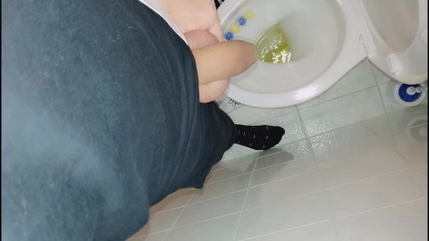 Twink with uncut cock piss in pee filled toilet at home