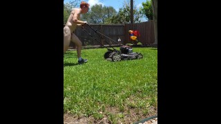 Readhead mowing lawn nude