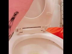 Standing slow piss with backside view