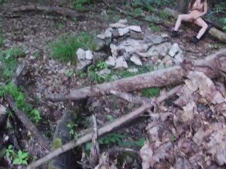 A wonderful girl masturbates in the woods