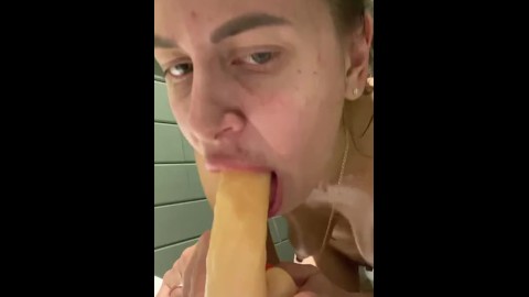 Undressed in the restaurant toilet and started fucking herself with a dildo