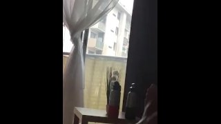Risky Masturbation In Front Of Neighbors Through A Window In A Flash