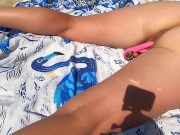 Preview 2 of My girlfriend without embarrassment masturbates and cums at the public beach full of people around
